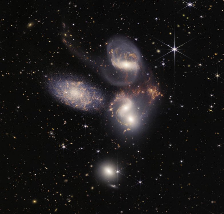 main_image_galaxies_stephans_quintet_sq_nircam_miri_final-1280.thumb.jpg.213e543520c82310c96fe5f2fb30834f.jpg